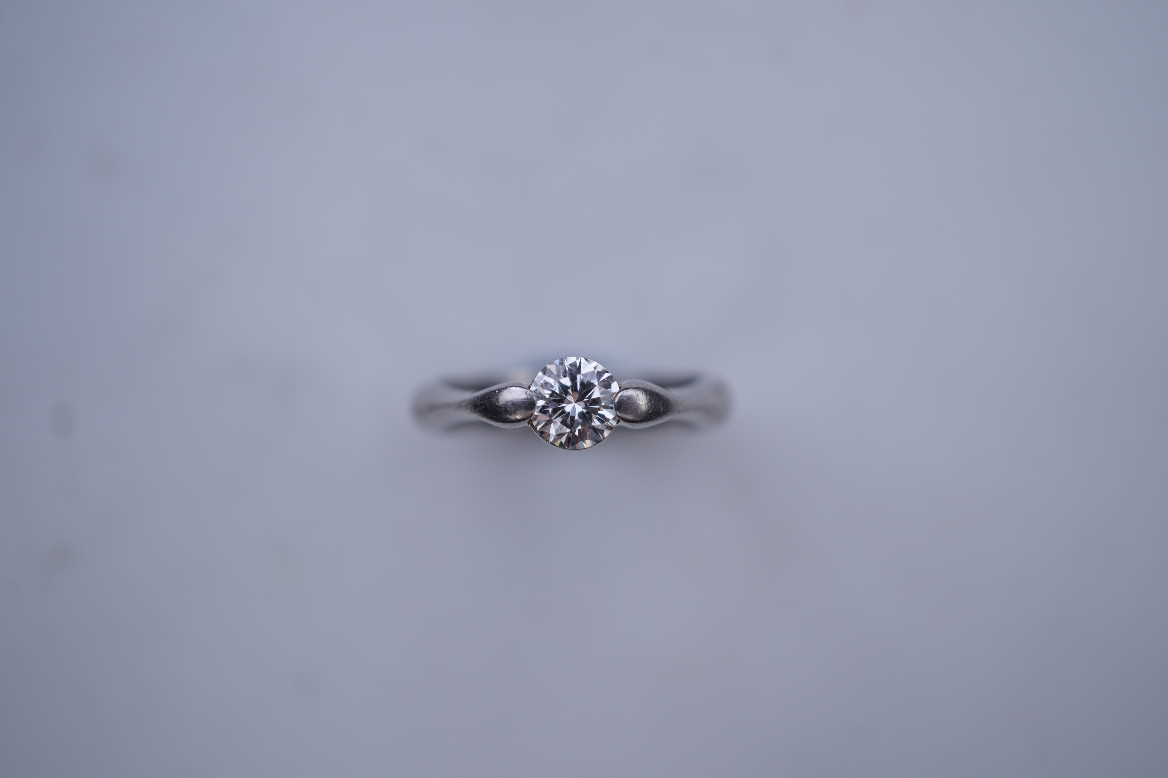 A diamond solitaire ring
